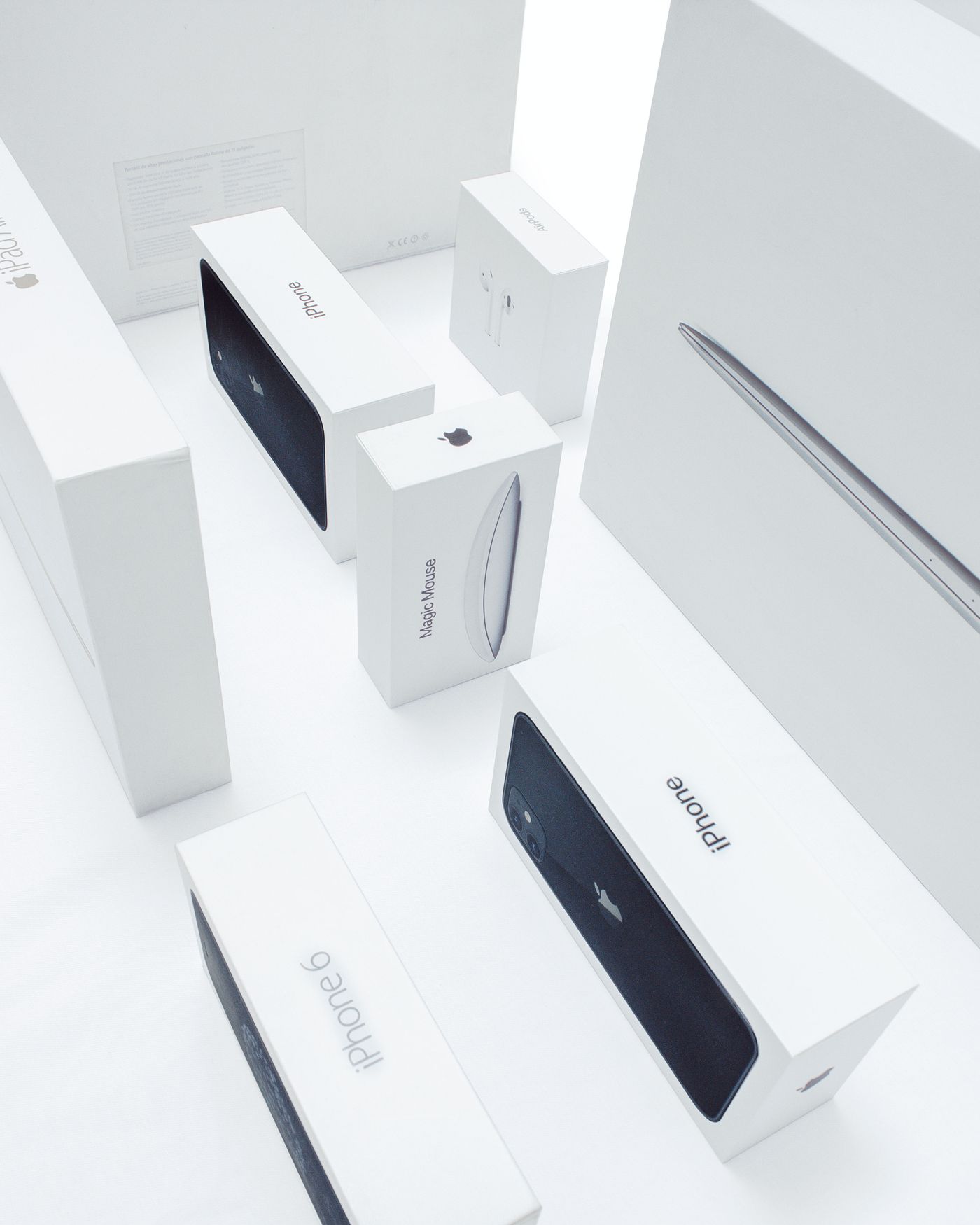 iPhone and other Apple product boxes arranged together