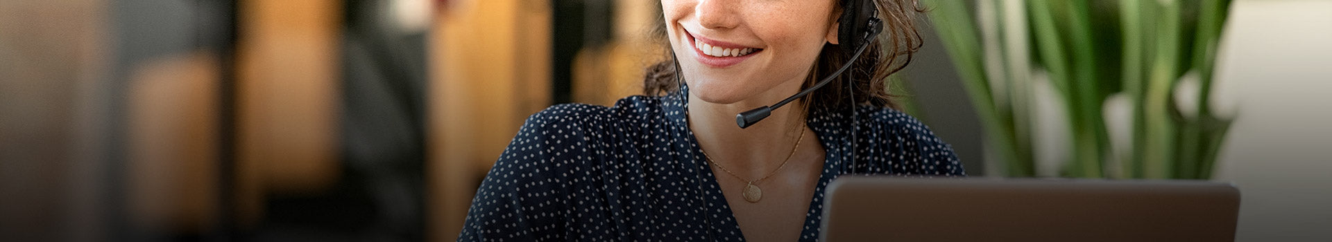 Customer support representative wearing a headset